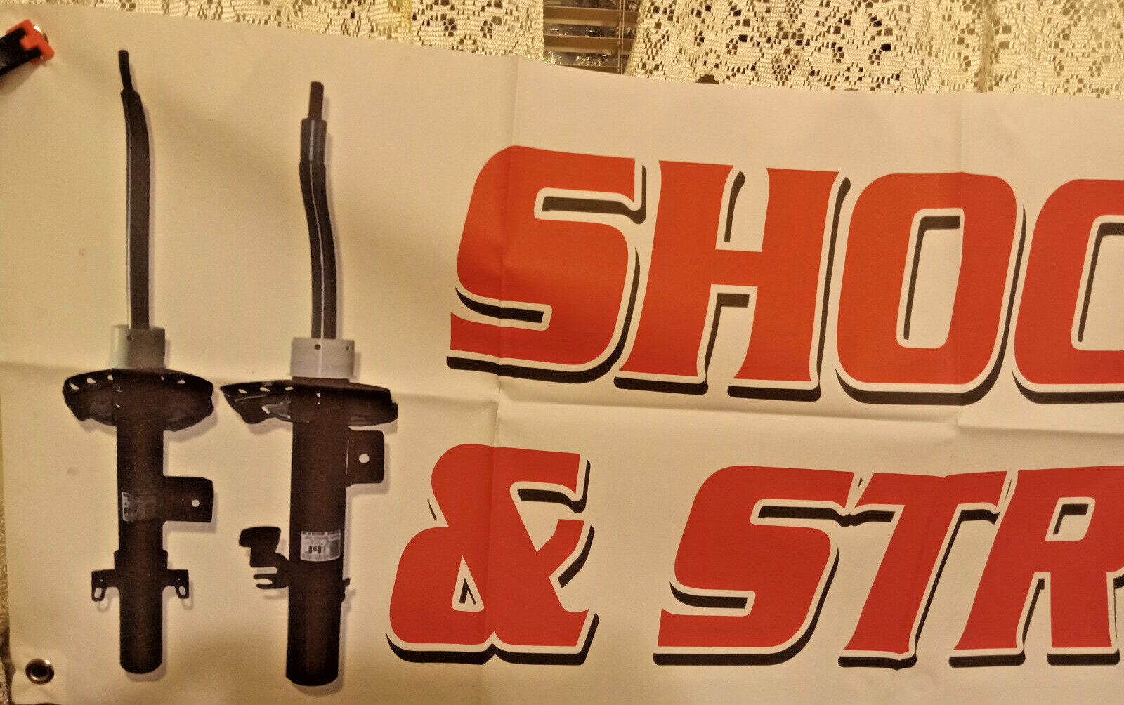 “SHOCKS & STRUTS” Vinyl Banner – WINDOW HANGING SIGN FESTAPRINT 18″X48″