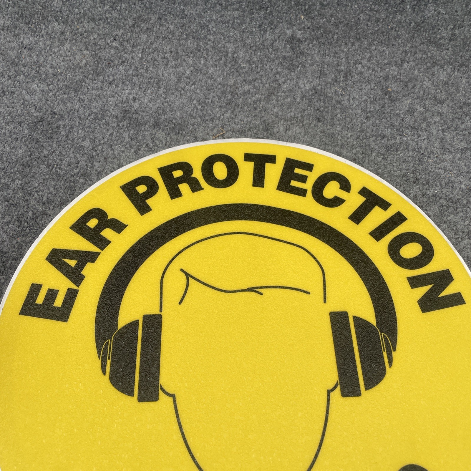 Accuform MFS202 EAR PROTECTION REQUIRED 17” Black/Yellow Floor Adhesive Vinyl