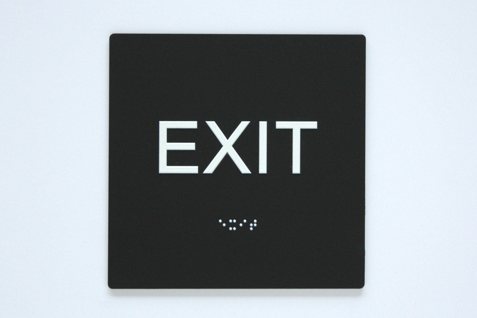 “EXIT” ADA / braille sign 4″ x 4″ matte black acrylic w/white tactile 