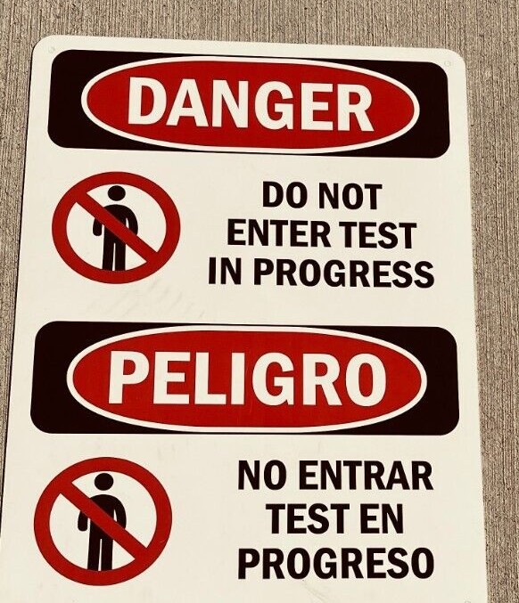 OSHA Danger – Do Not Enter Test In Progress Bilingual | Heavy Duty Sign or Label