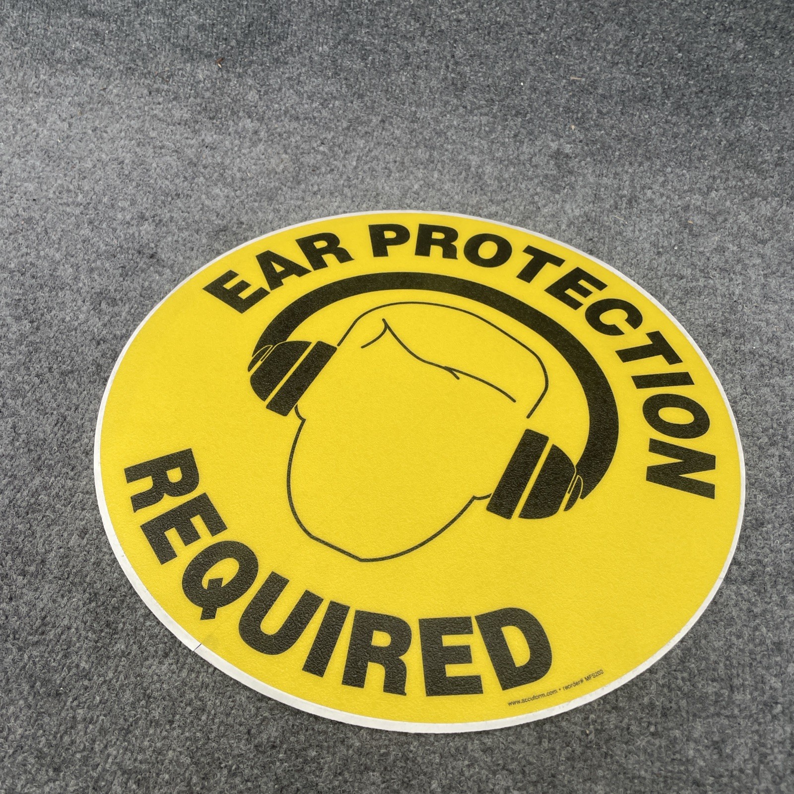 Accuform MFS202 EAR PROTECTION REQUIRED 17” Black/Yellow Floor Adhesive Vinyl