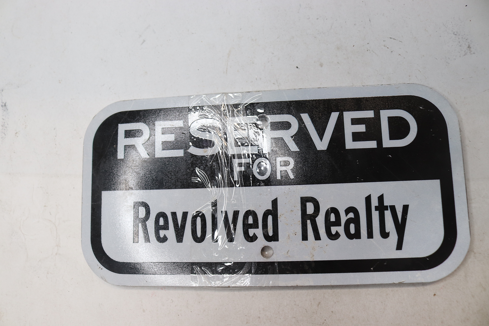 Reserved for Revolved Realty Sign 6″ x 12″