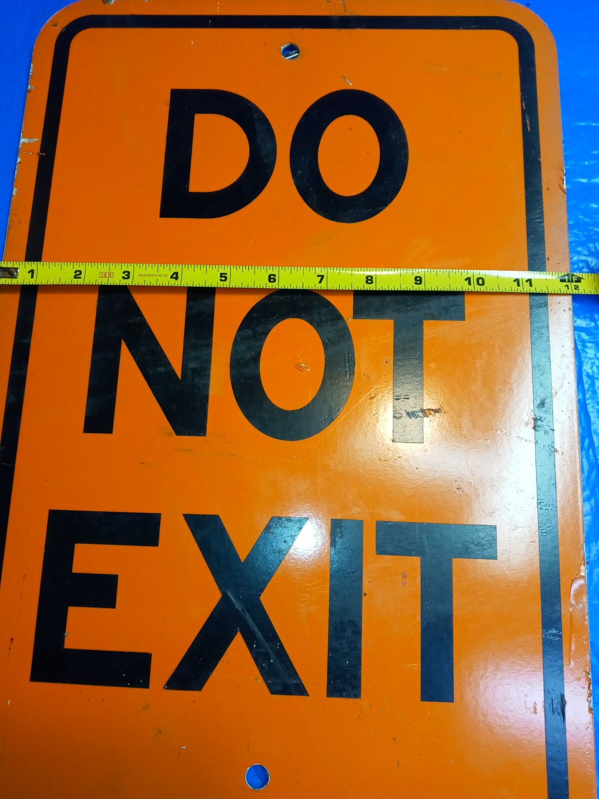DO NOT EXIT SIGN 12X18 INCHES ORANGE ALUMINUM USED READY FOR SERVICE.