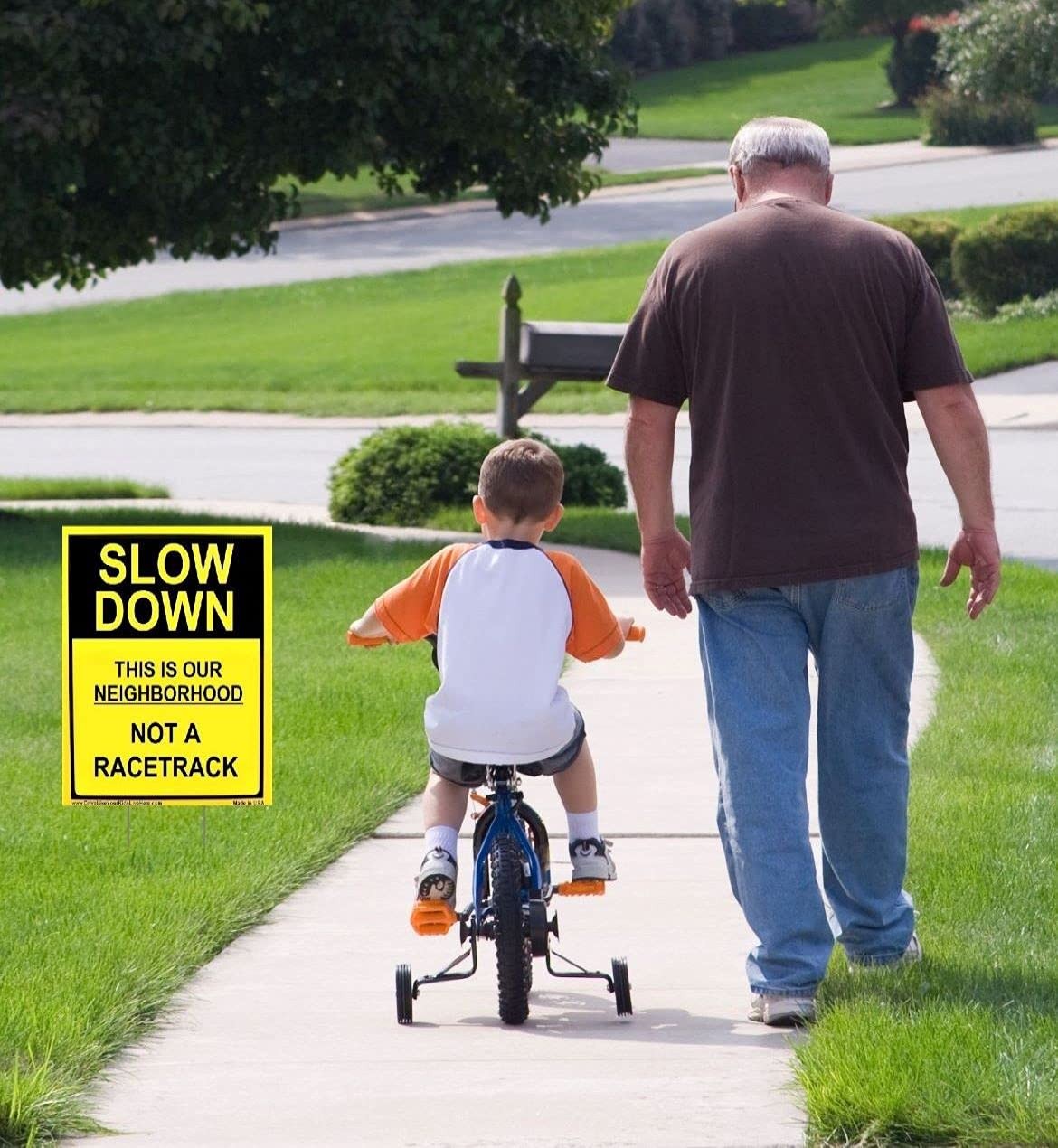 Slow Down This Is Our Neighborhood Not A Racetrack 12×18 inches, Yellow