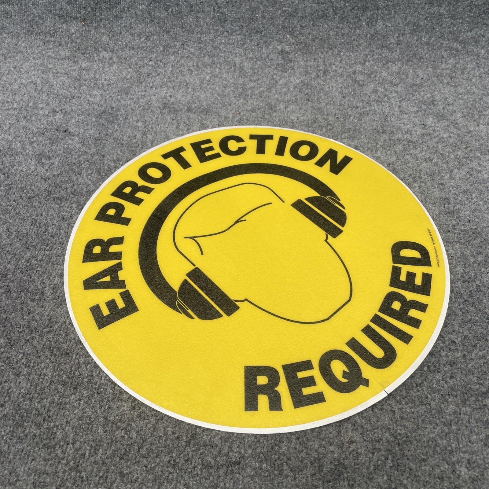 Accuform MFS202 EAR PROTECTION REQUIRED 17” Black/Yellow Floor Adhesive Vinyl