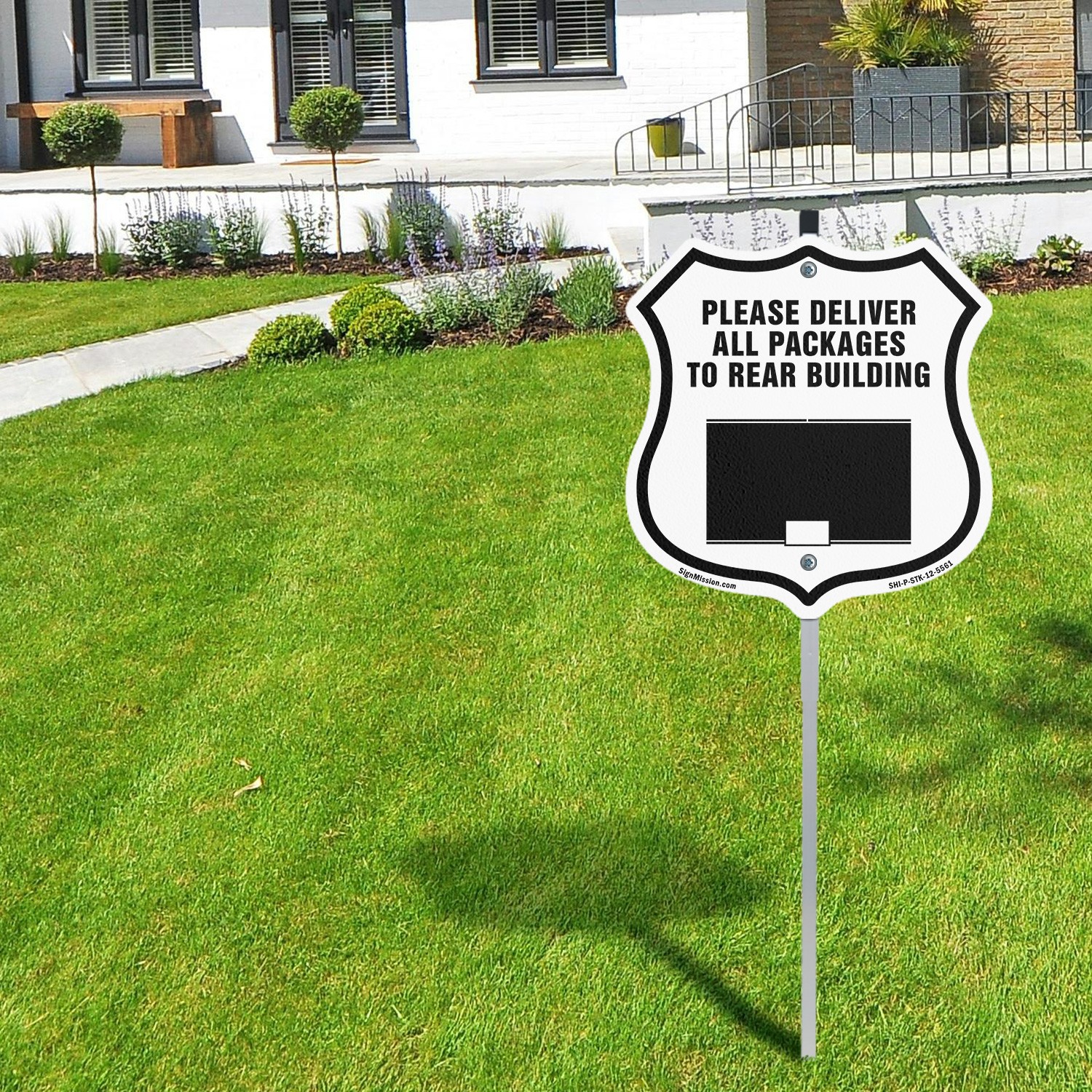 Please Deliver All Packages To Rear Shield Shaped Sign With Stake