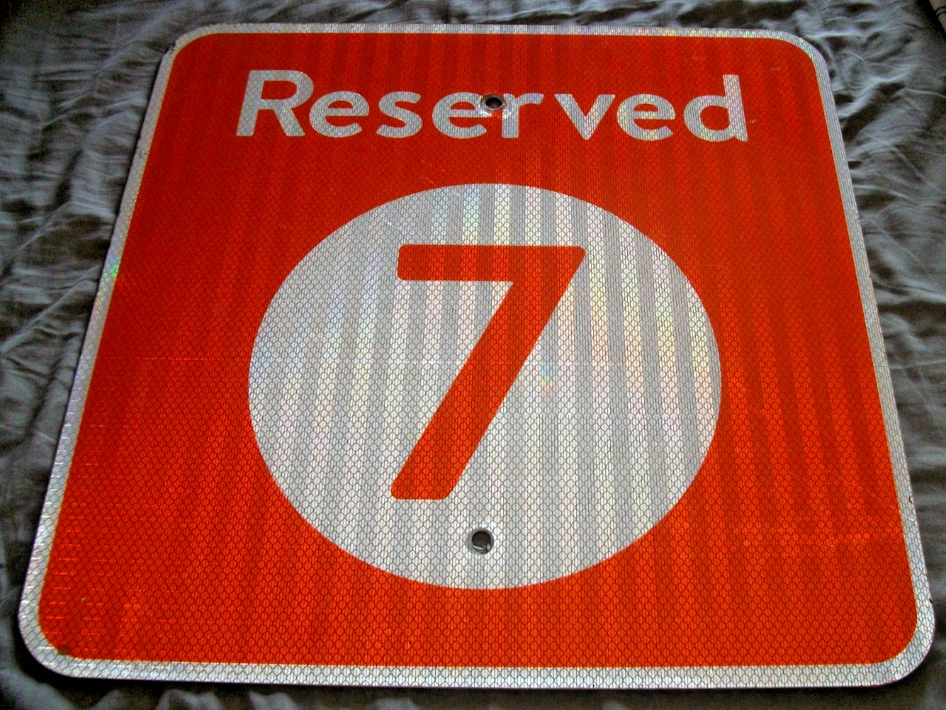 SCARCE USED WALMART ORANGE REFLECTIVE ALUMINUM RESERVED 7 PARKING SPACE SIGN