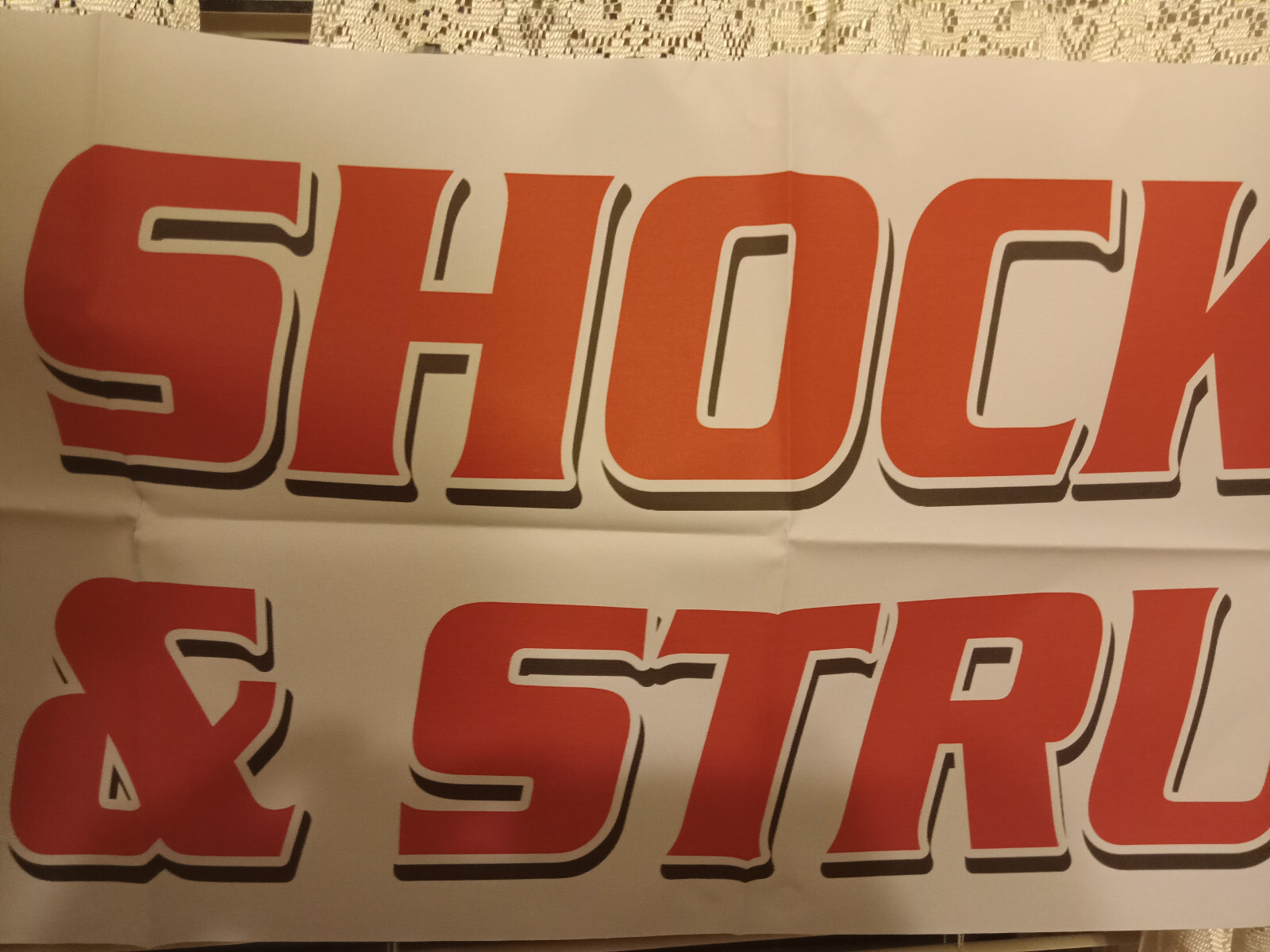 “SHOCKS & STRUTS” Vinyl Banner – WINDOW HANGING SIGN FESTAPRINT 18″X48″
