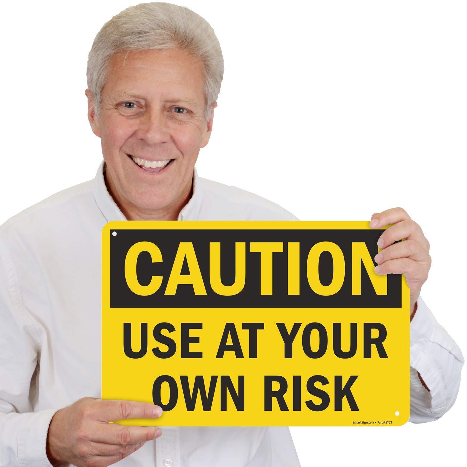 12 x 18 inch “Caution – Use at Your Own Risk” Metal Sign with Pre-cleared hol…