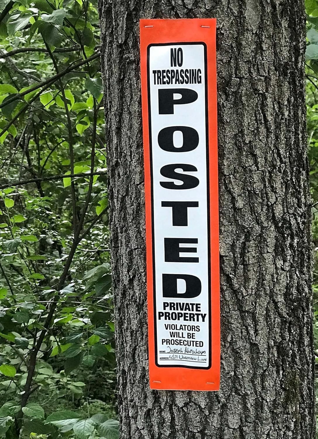 Posted Sign Orange No Trespassing for outdoors – 4″ x 20″ 100 per Roll –